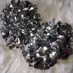 A set of silver Pom- poms
